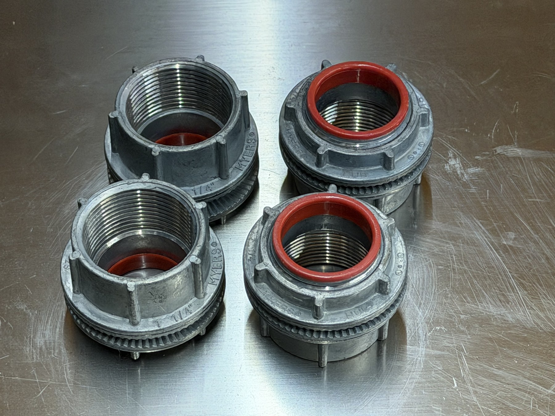 Myers 1-1/4-inch Conduit Hubs — Lot of 4